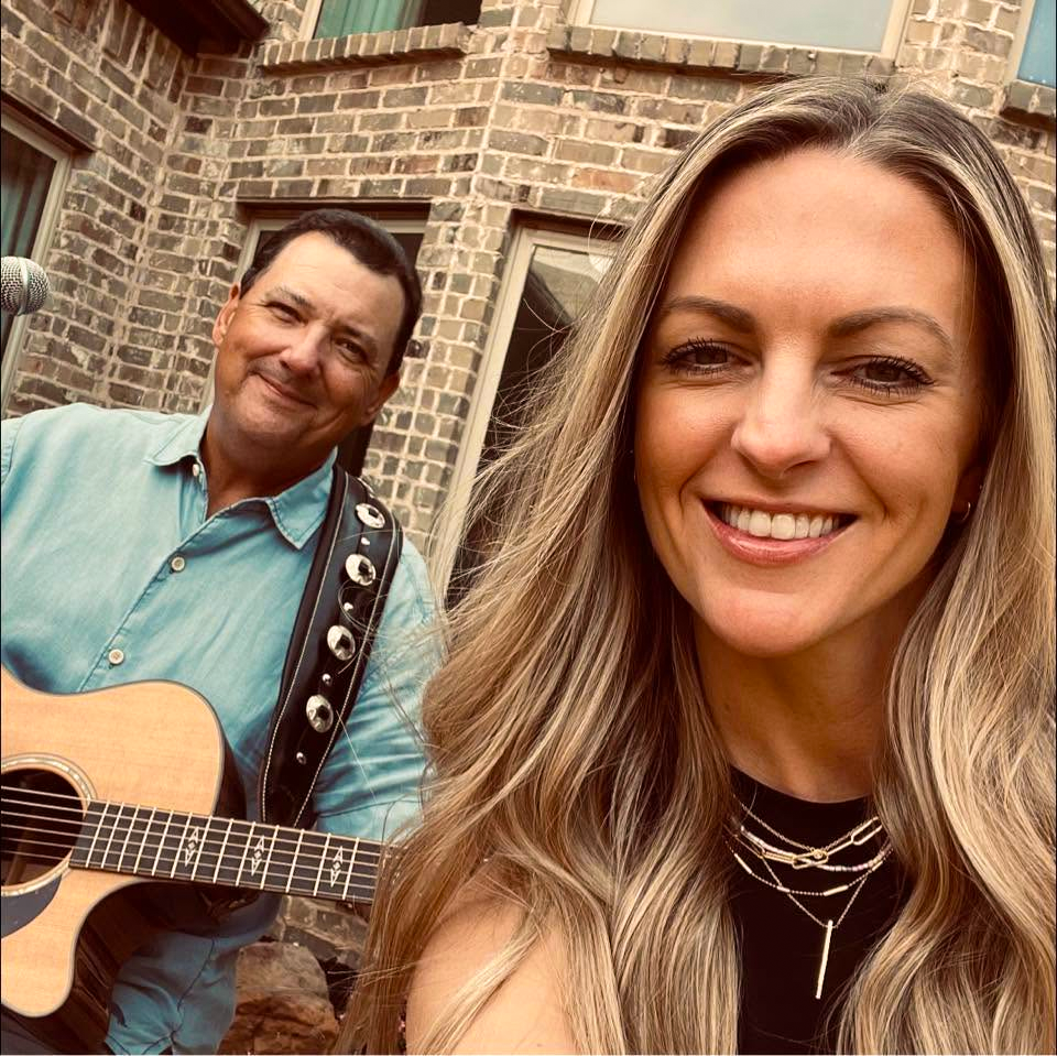 Jessica and Travis smiling together